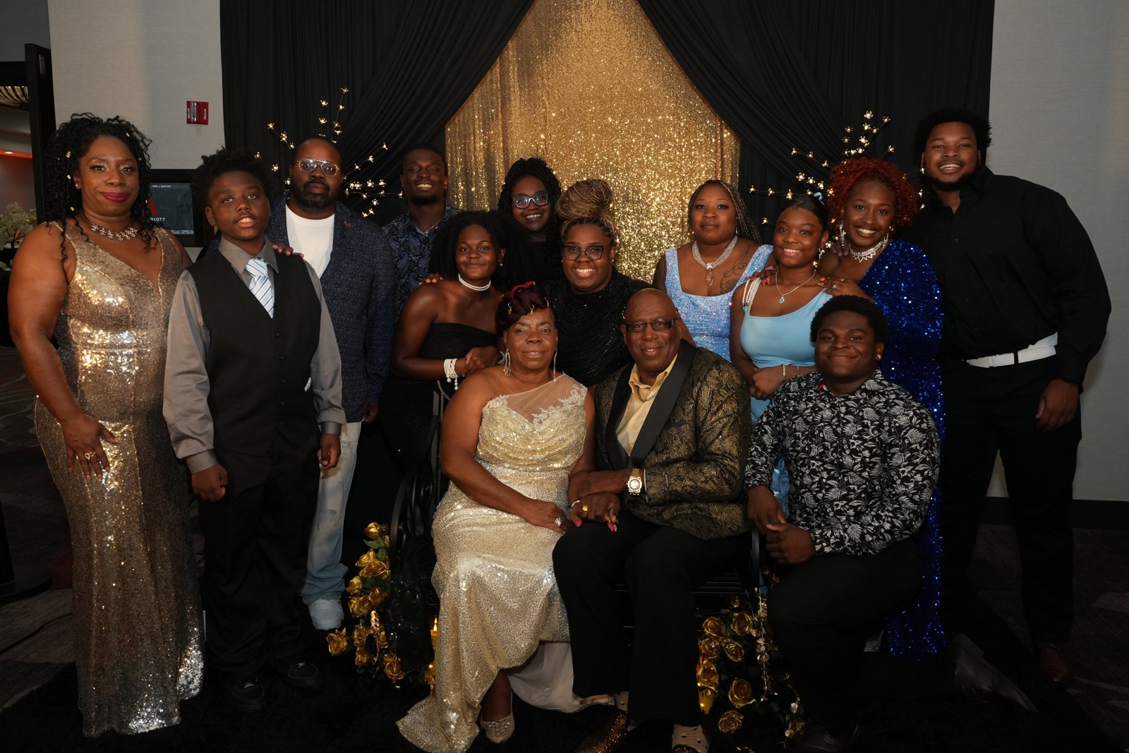 A family of fourteen spanning three generations gathers at the Freedom Charity Ball