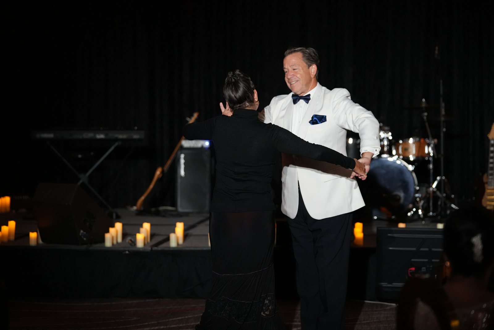 Jerry and Virginia LeNoir in a ballroom hold on the floor
