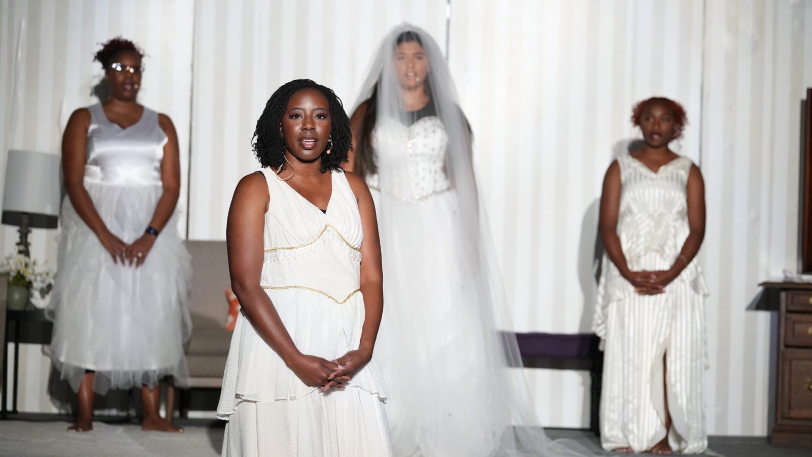 Vanity opens the production's final procession, with each sister following before Renee's concluding entrance